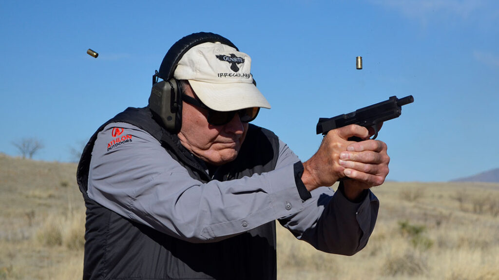 The author shooting the Colt 01911SE-A1 1911 Pistol from a standing position.