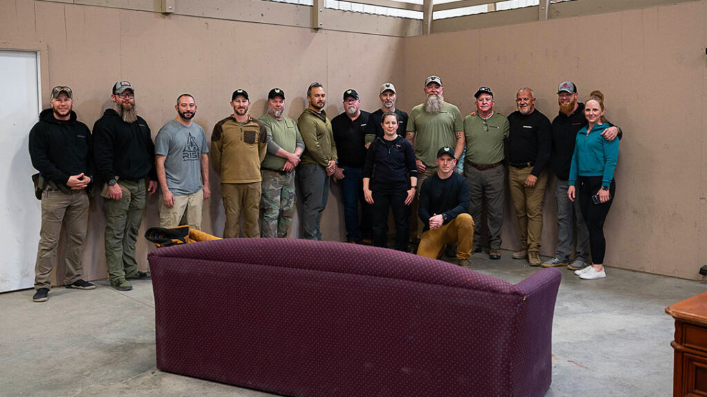 A full class assembled for a class on the realities of home defense.