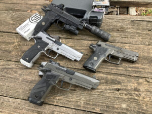 An assortment of SIG P226 pistols.