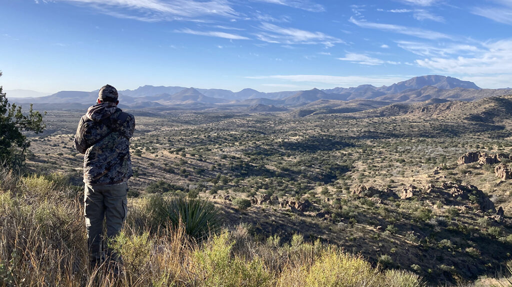 Glassing wide open country during a hunt out west. 