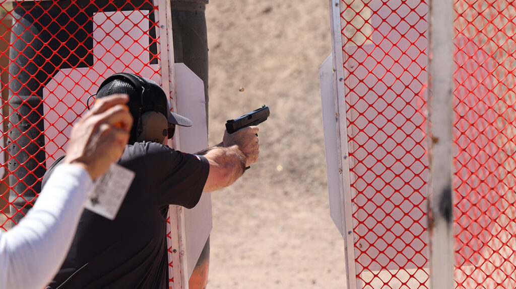 The author competing in a USPSA match with the XS Fiber Optic Sights installed on his Gen 3 Glock 35.