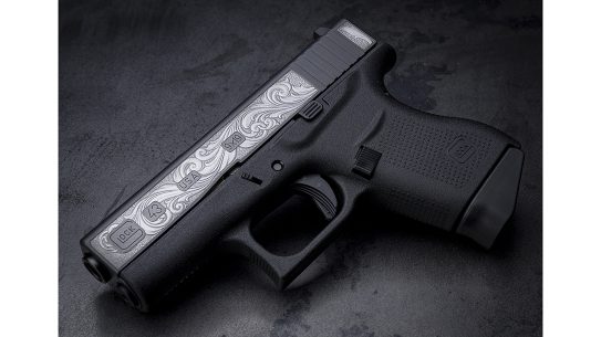 Built to carry, the Davidson's Glock 43 stands out with remarkable engraving on both sides of the slide.