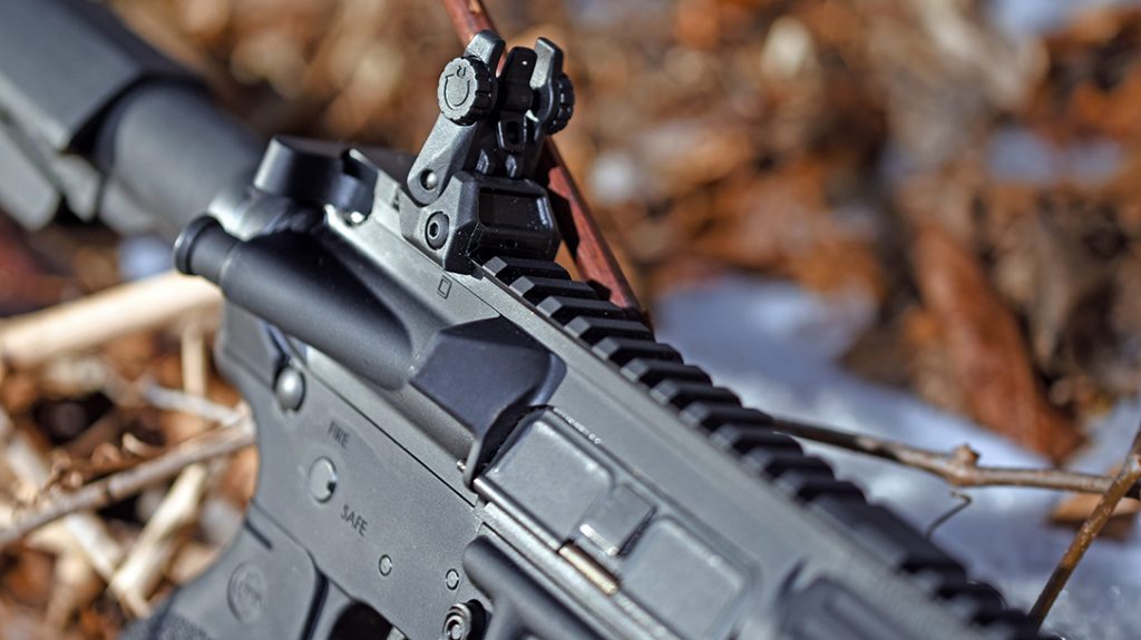 The RRA NSP flip-up front and rear sights require the use of both hands to pull into place.