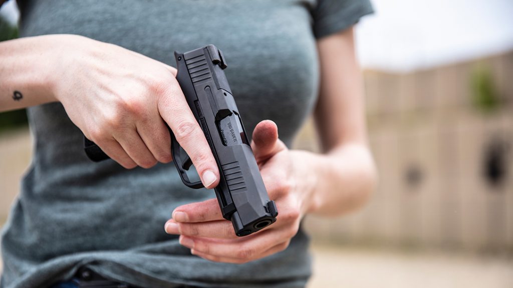 The Sig Sauer P365 XL holds 13 rounds of 9mm and offers a balance of micro-compact concealability and full-size shootability. It’s also red-dot sight (RDS) ready, which is perfect for surviving civil unrest.