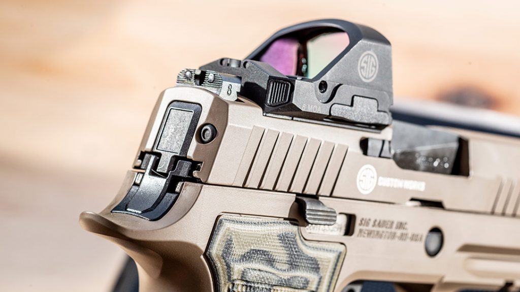 The optic ready slide of the Sig Sauer AXG Scorpion is compatible with many platforms, including the Sig Romeo 1PRO.