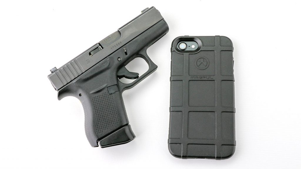 Your phone can be as important as your gun. Shown: Glock 43 9mm, iPhone in sturdy MagPul carrier.