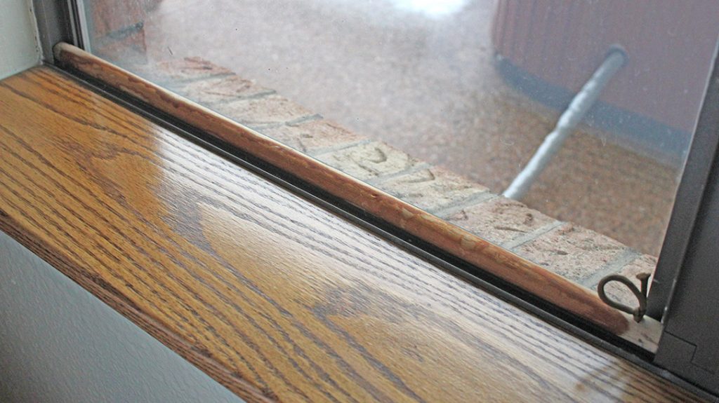 Secure sliding windows with hardwood dowels cut to length. A cord loop allows easy removal in an emergency, which may include using the dowel as a weapon.