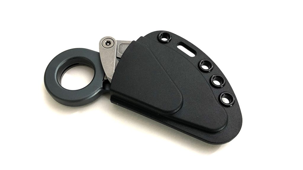 The sheath offers a carry method with eyelets for your choice of attachment.