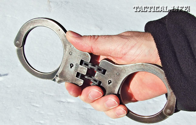 The author’s original set of Peerless hinged handcuffs have seen 33 plus years of continuous duty without faltering.