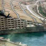 A helicopter oversees the Haditha Dam, which provides electricity to a third of Iraq.