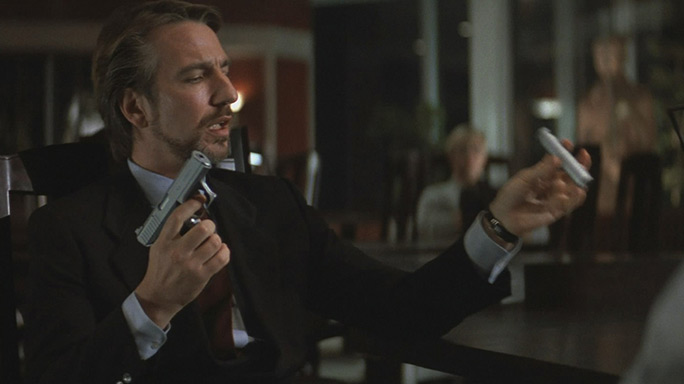 Hans Gruber removing the suppressor from his Heckler & Koch P7M13 in Die Hard