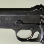 Inglis Hi-Power pistol slide release