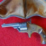 Woman's smart leather purses held old west guns such as this Colt Open Top Pocket Model